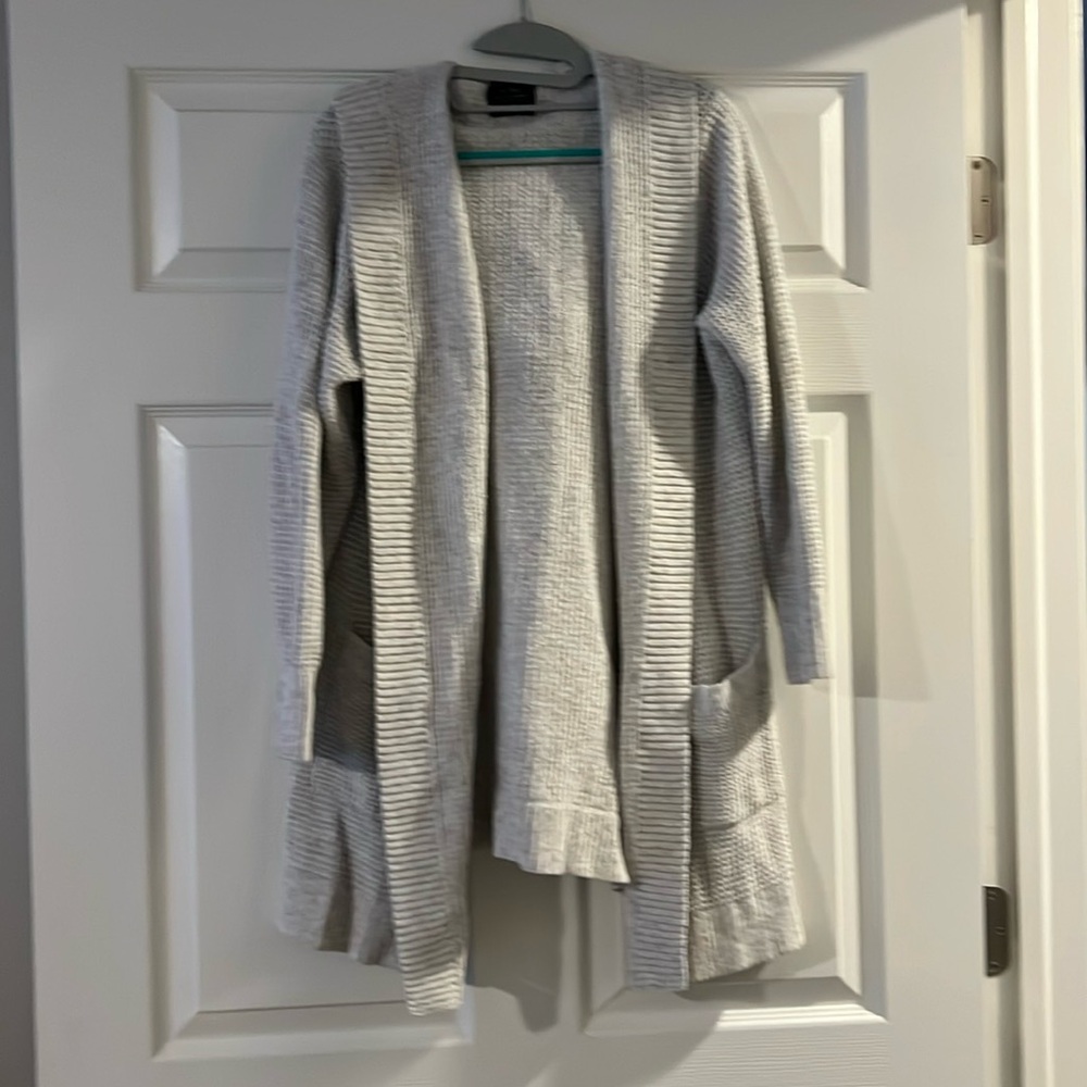 Beautiful sweater to eat over any top going out heading to work